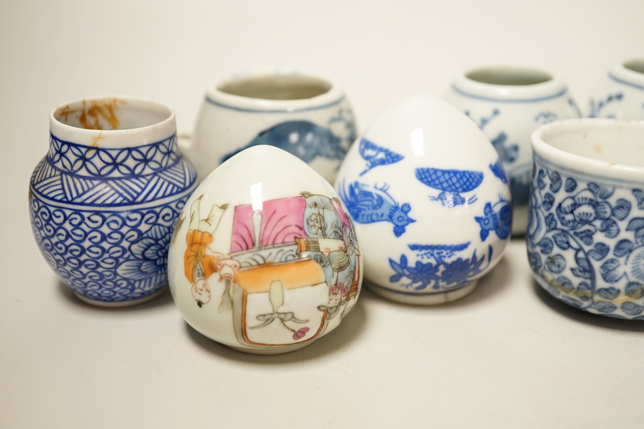 Ten Chinese porcelain bird feeders, 19th/20th century, 4.5cm